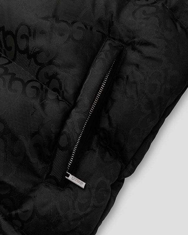 Detail view of black Geedup Mono Jacquard Duck Down Jacket
